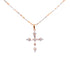 An Iced Crucifix Zirconia Pendant Necklace in two-tone rose gold, adorned with small, sparkling diamonds against a white background.